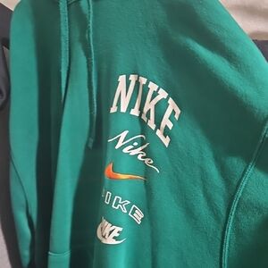 Nike Green V-Neck Sweater with Iconic Branding